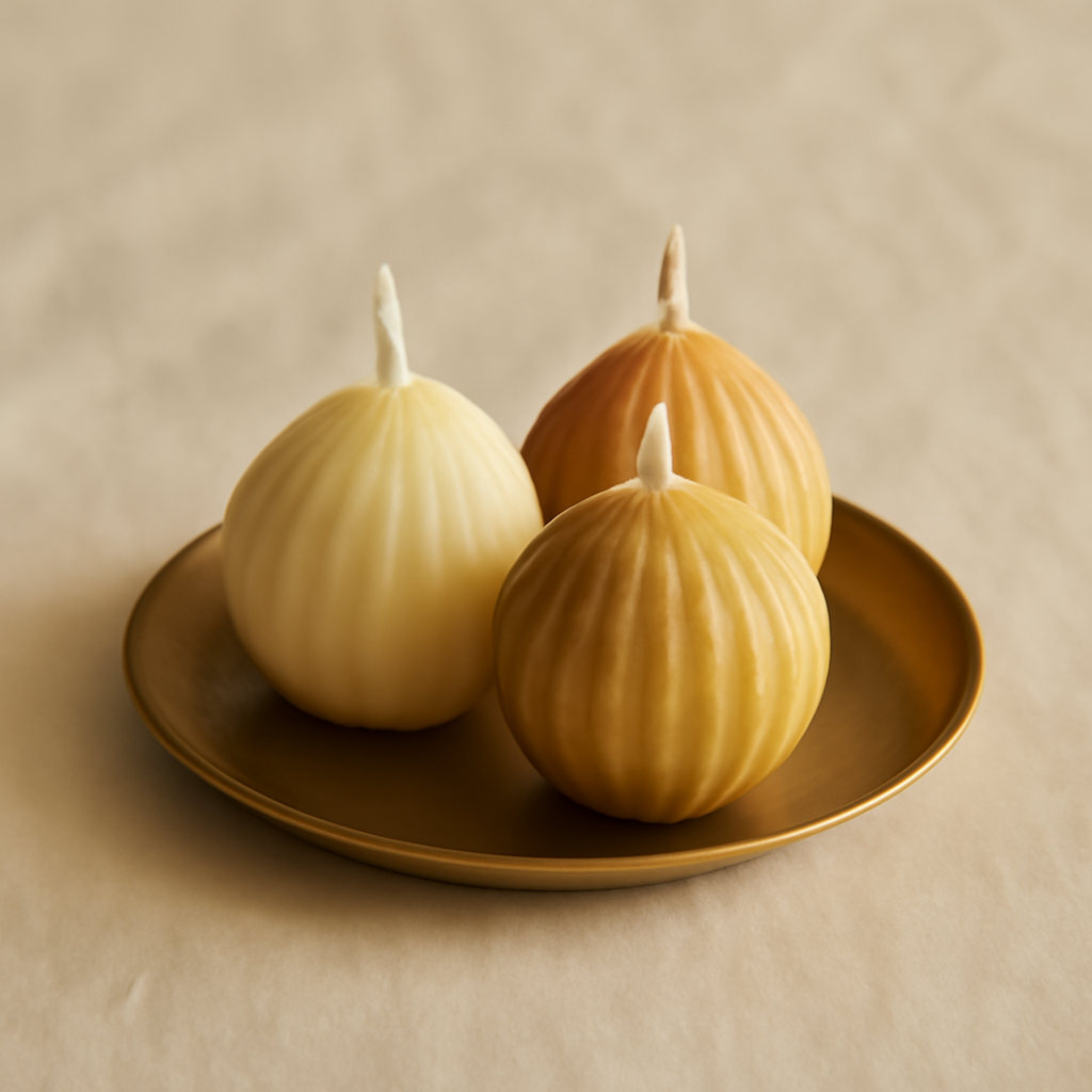 Laddoo Trio Candle Set with three laddoo-shaped sculpted candles