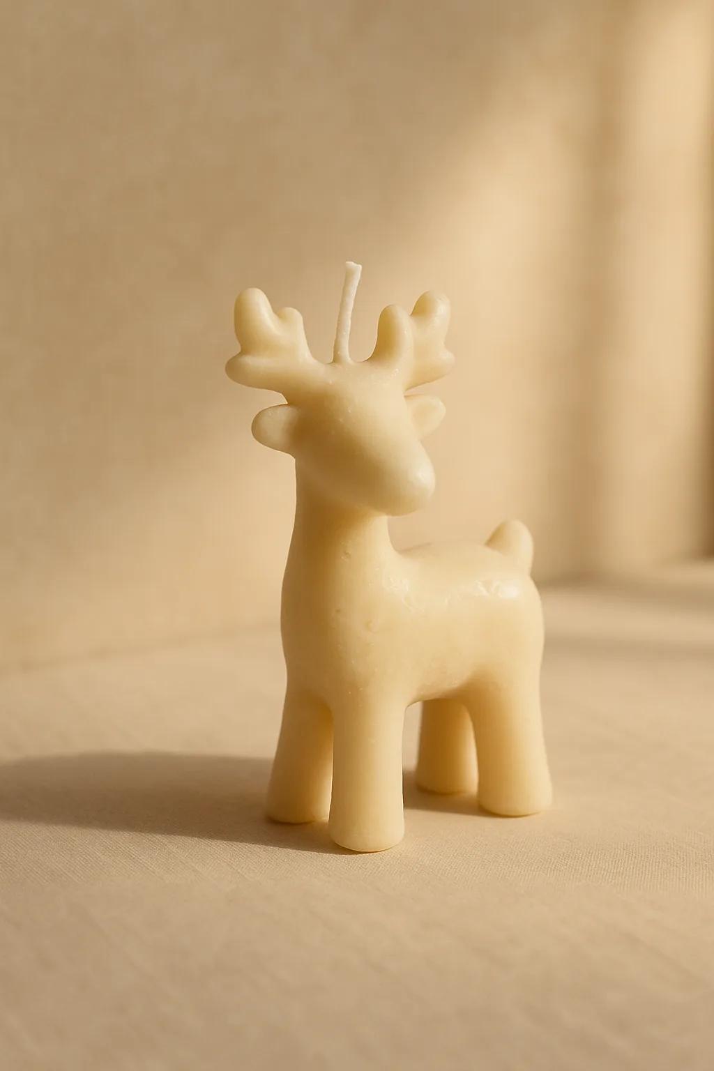 Sculpted reindeer candles for festive mantel or table decor